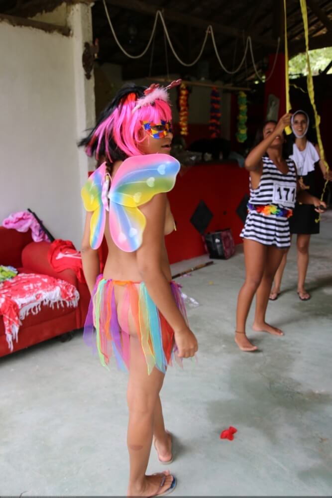 Tropical carnival photo gallery - Nudity in naturism is not usually an end in itself