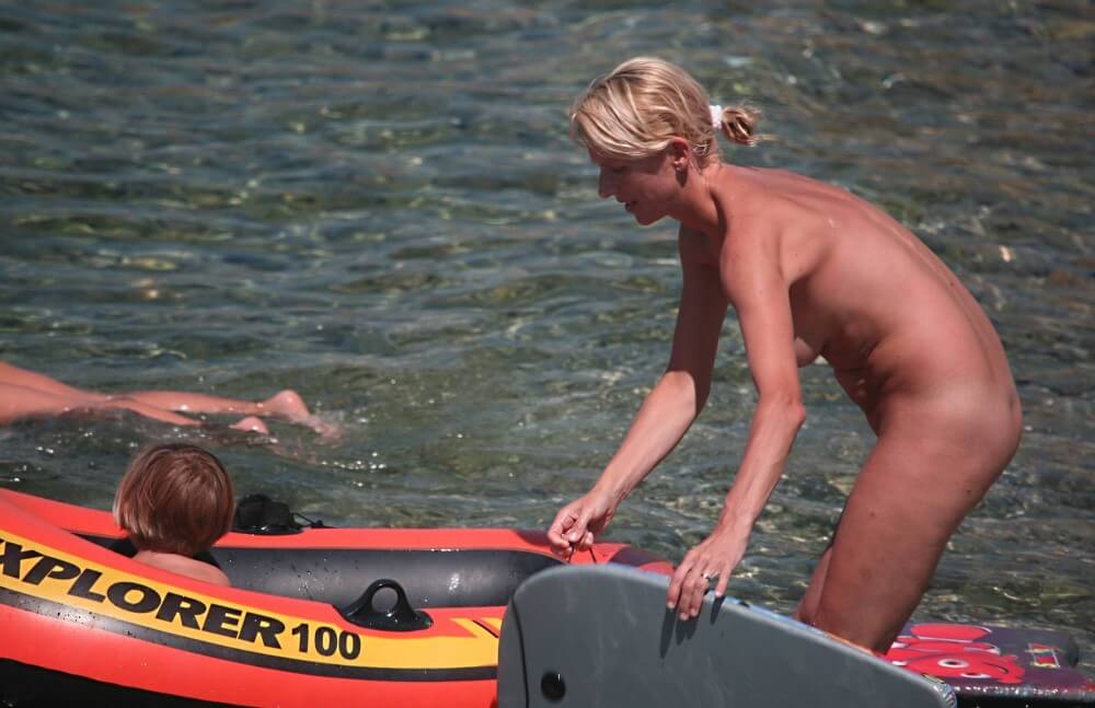Red Boating for Two Nudists pics - This is how naturism culture manifests itself
