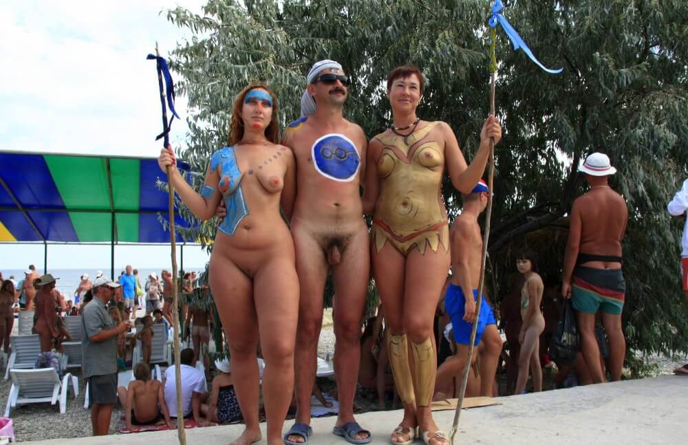 Three Painted Girl Poses pics - Blending in with the crowd of nudists