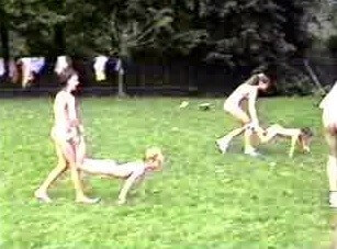 A nudist gathering at the stadium and sports - The nudist community strives for tolerance