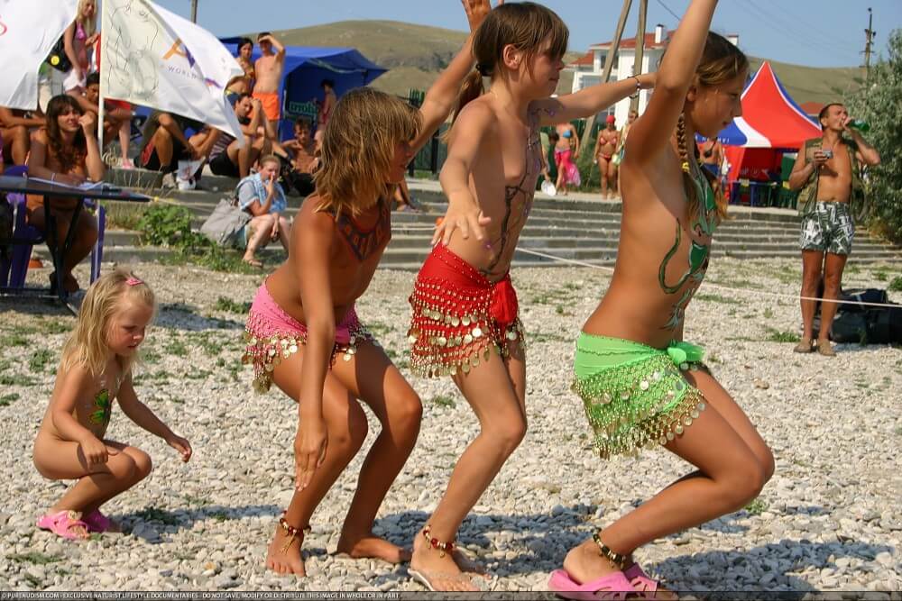 Festival and dancing photos - A defining feature of naturism is the absence of clothing