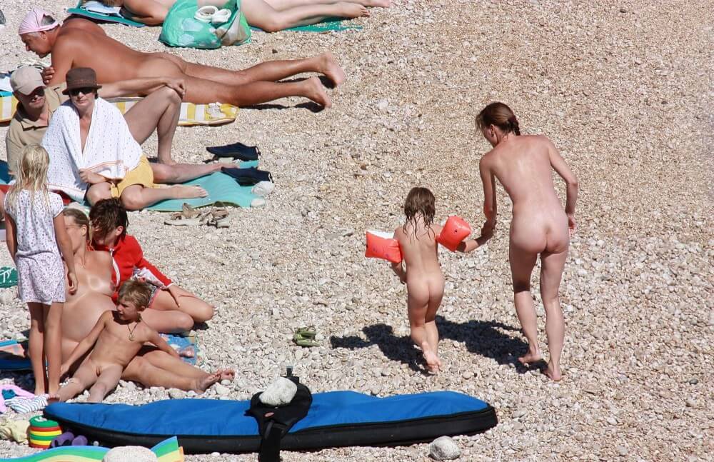 Orange Floaty Safety First Naturist pics - The emergence of naturism is linked to the name of Soren Sorensen