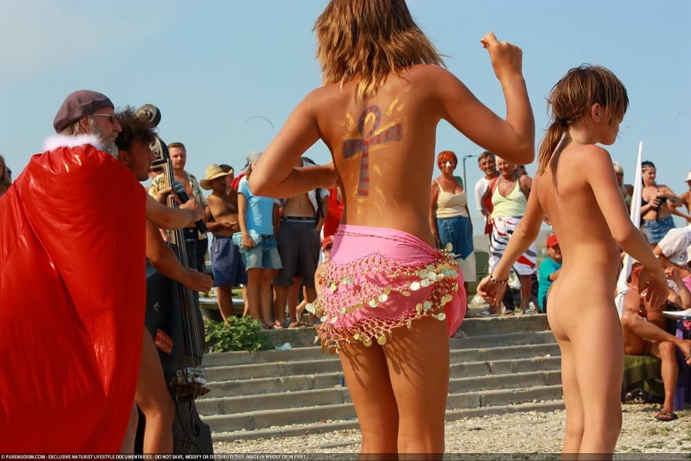 Colorful Carnival Dancing photos - Naturism encourages sincerity and honesty regarding the body